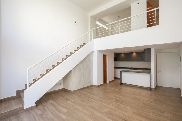 Two-room front loft with balcony, garage, and amenities